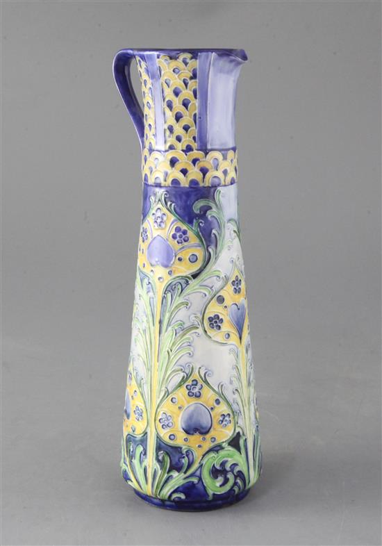 A Moorcroft Macintyre Florian ware tall tapered jug, stylised peacock feather design, 25cm